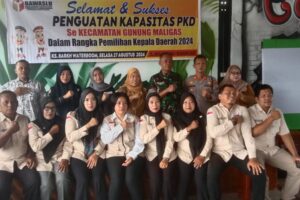 Kapolsek Bangun Hadiri dan Jadi Narasumber di Acara Penguatan Kapasitas Panwaslu Kelurahan/Desa Gunung Maligas