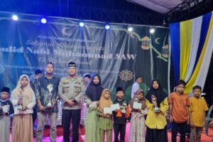 Kapolsek Perdagangan Hadiri Peringatan Maulid Nabi di Masjid Al Jihad, Ajak Masyarakat Tingkatkan Ukhuwah Islamiyah