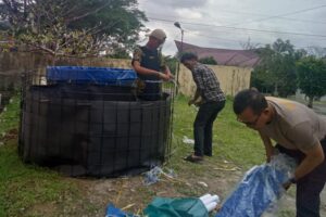 Polres Simalungun Dukung Program Ketahanan Pangan, Kabag SDM Bangun Kolam Ikan untuk Peningkatan Pangan di Lingkungan Polres