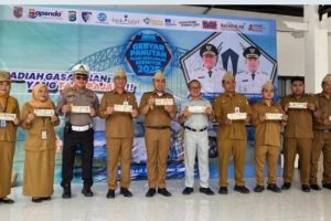 Pemkab Barito Kuala Gelar Upacara Gabungan dalam Rangka Gebyar Panutan Pajak Kendaraan Bermotor 2025.